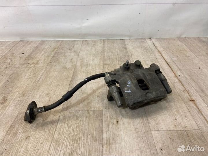 Суппорт задний левый Mitsubishi Lancer 10 CY3A