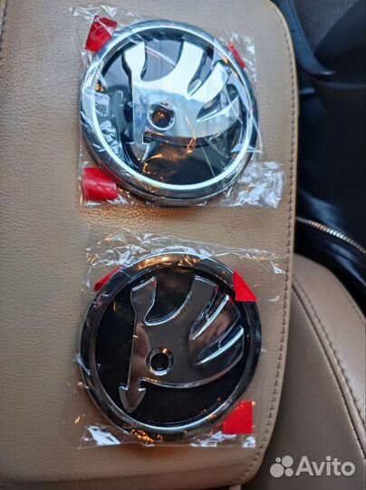 Эмблемы Skoda
