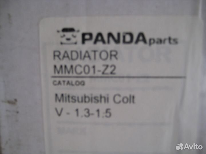 Радиатор охлаждения Mitsubishi Lancer