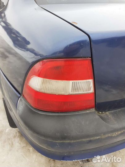 Фонарь левый Opel Vectra B