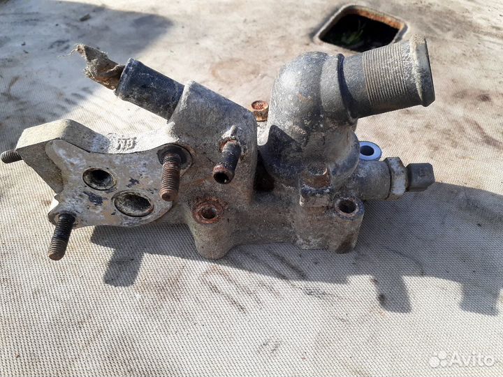 Корпус термостата Шевроле Авео