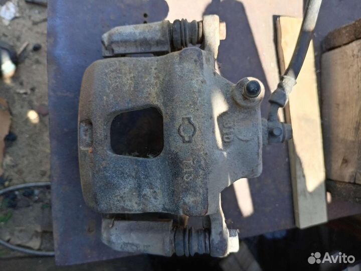 Супорт Nissan cefiro а32