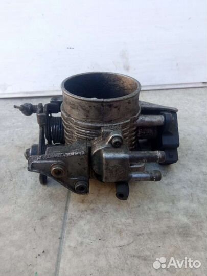 Дроссельная заслонка Opel Omega B 90411550