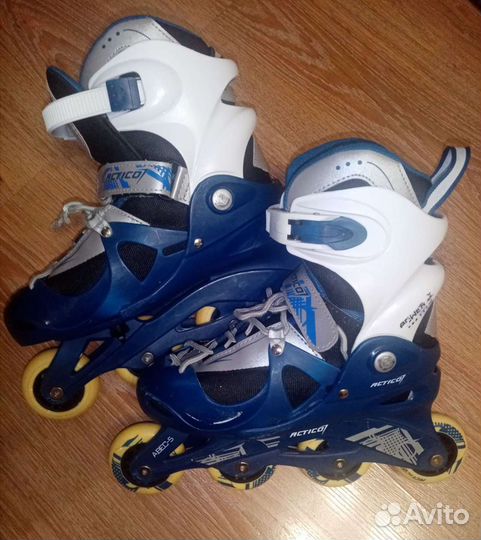 Коньки роликовые