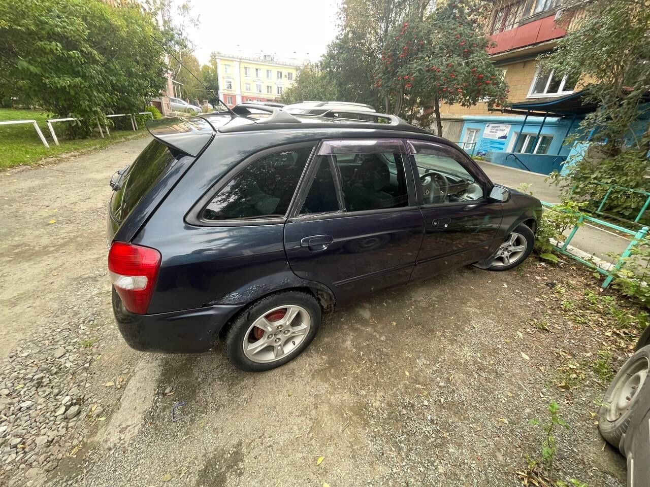 Mazda Familia: фото владельца