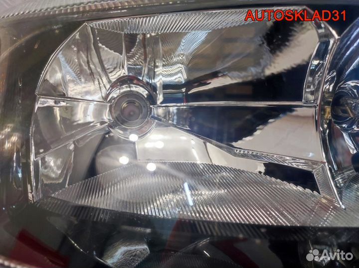 Фара правая Opel Astra G 1EG00764040