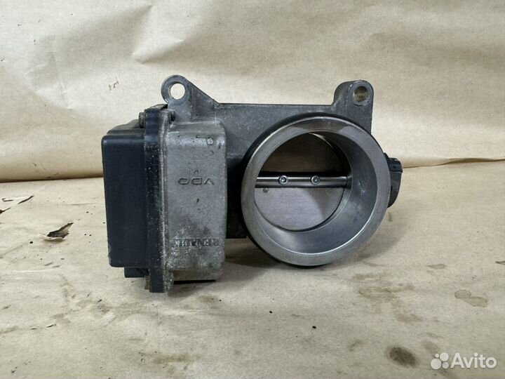 Заслонка Рено Логан. Нисан Альмера