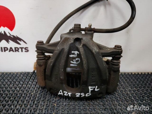 Суппорт тормозной передний левый Toyota Avensis