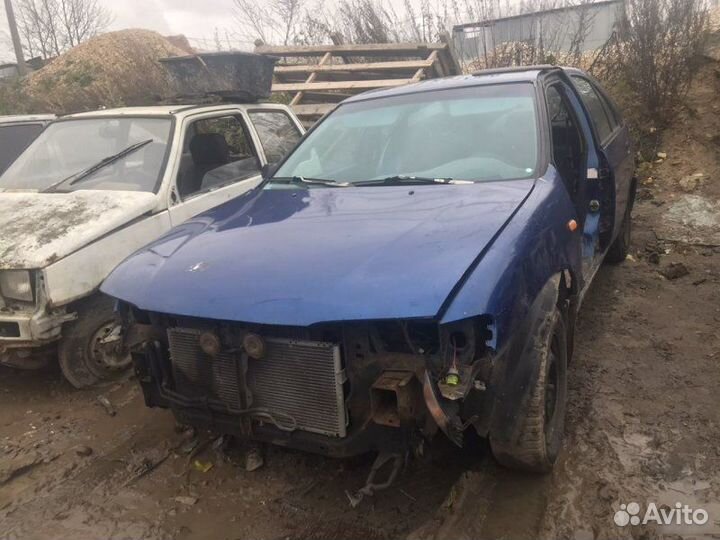 Суппорт Nissan Almera N15