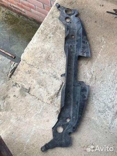 Кожух замка капота ниссан Тиида