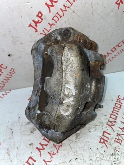 Суппорт тормозной передний правый Mazda Cx7 CBA