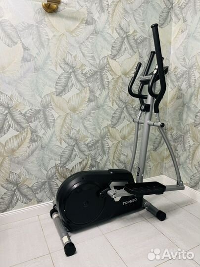 Эллиптический тренажер torneo