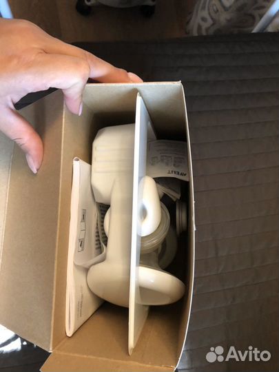 Молокоотсос ручной с набором контейнеров для хране