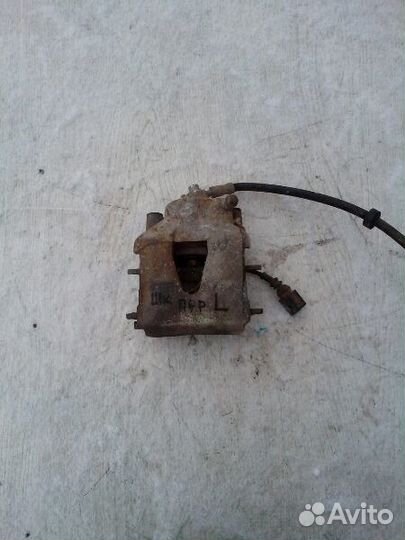 Суппорт левый Шкода Октавия Тур Skoda Octavia Tour