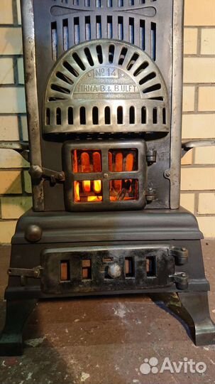 Старинная чугунная печь