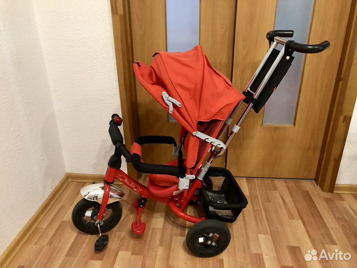 Детский трехколесный велосипед с ручкой