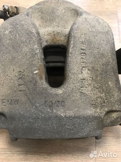 Суппорт тормозной задний левый Bmw X5 4.8I E70