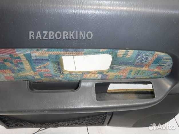 Обшивка двери передней левой