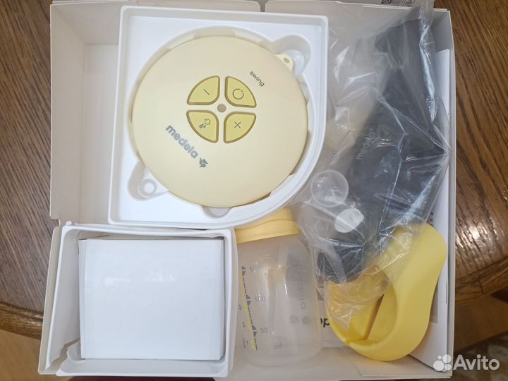 Молокоотсос medela электрический новый