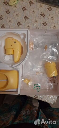 Молокоотсос электрический