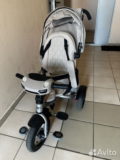 Бежевый детский велосипед с ручкой