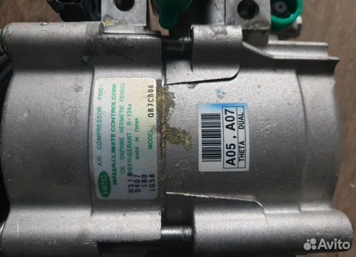 Компрессор кондиционера 977014H100 Grand Starex