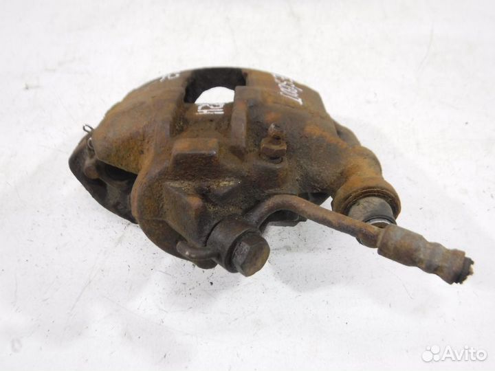 Суппорт тормозной передний правый Ford Escort