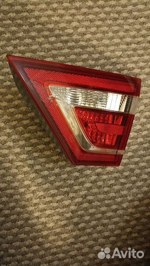 Правый треугольник багажника vesta