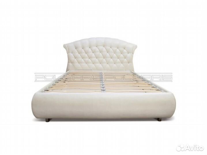 Кровать в мягкой обивке 