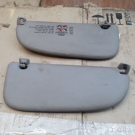 Козырек правый солнцезащитный Пежо 206