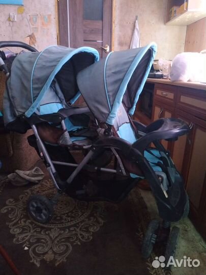 Коляска двухместная
