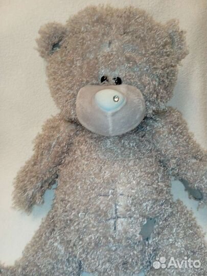 Большой мишка Тедди и куклы