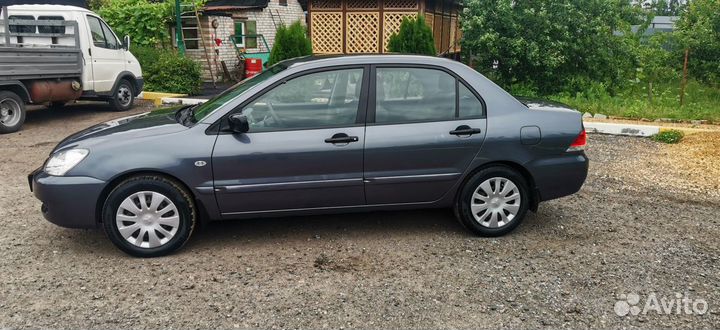 Mitsubishi Lancer 1.3 МТ, 2006, 56 600 км