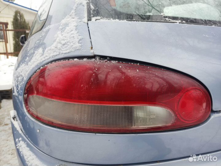 Фонарь левый Mitsubishi Colt CA 4 поколение 92-96