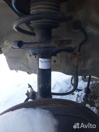 Nissan almera n16 стойка амортизатор