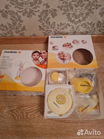 Молокоотсос medela swing электрический