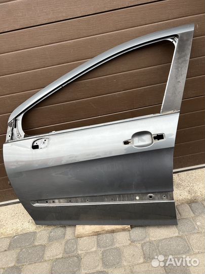 Дверь передняя левая Peugeot 308