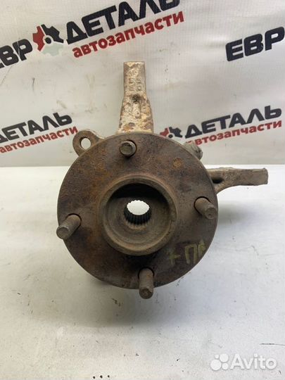 Кулак поворотный передний левый Mitsubishi Lancer