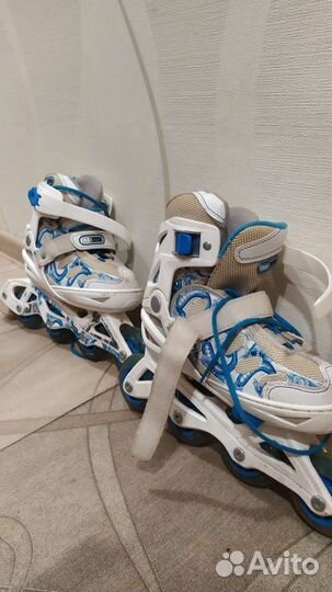 Роликовые коньки