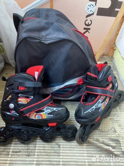 Роликовые коньки