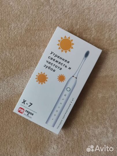 Электрическая зубная щетка новая