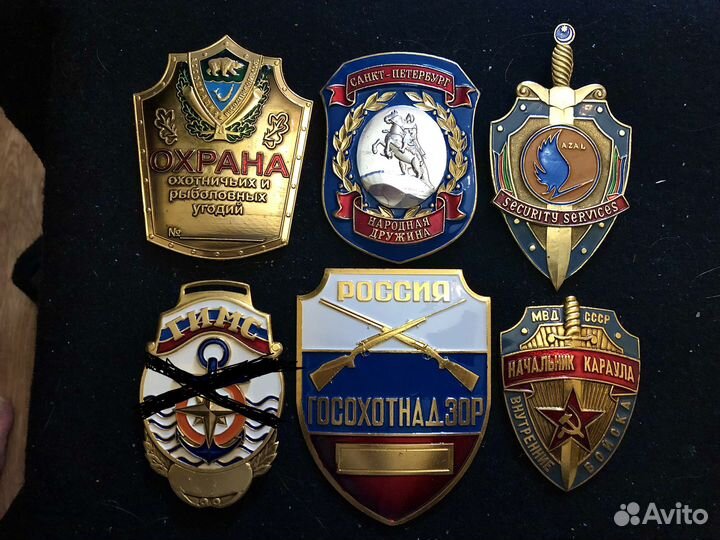 Нагрудные бляхи и знаки