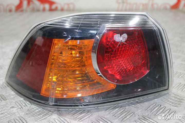 Фонарь задний левый Mitsubishi Lancer 10 X дефект