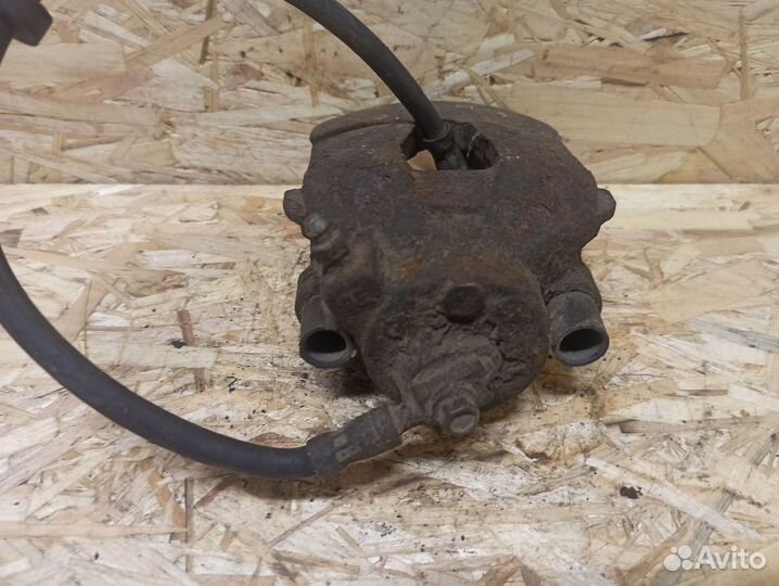 Суппорт передний левый Volkswagen Golf 4, Bora