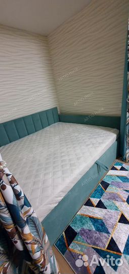 Кровать с подъемным механизмом