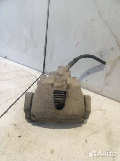 Суппорт тормозной передний левый Ford Focus 2 CB4