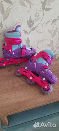 Роликовые коньки с полным комплектом защиты