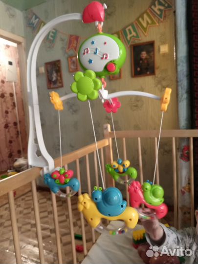 Детский мобиль в кроватку музыкальный