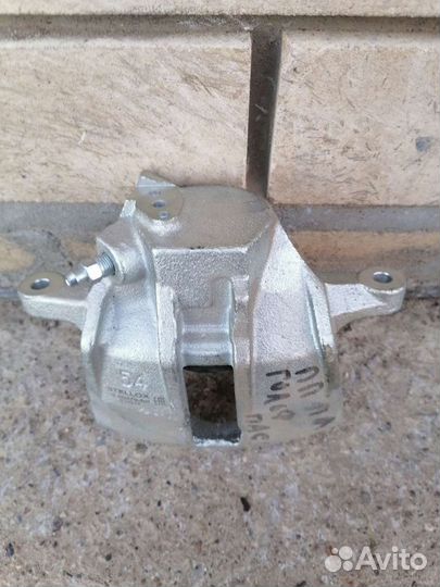 Суппорт предний Passat B4 Audi 80