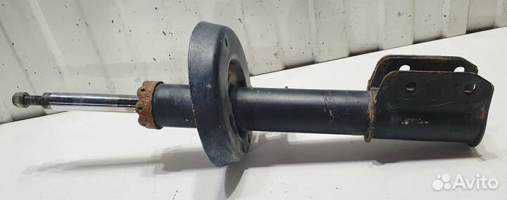 Амортизатор передний левый Opel Astra G